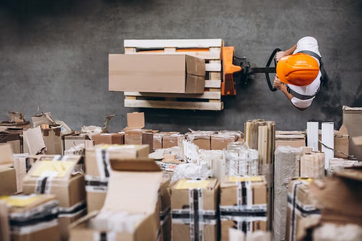 imgi 19 young man working warehouse with boxes 1303 16619